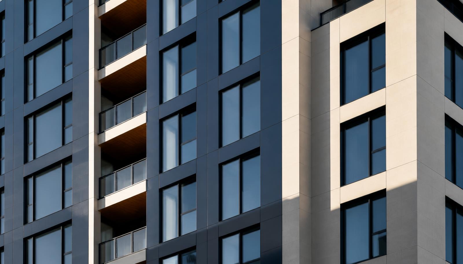 Facade detail of a contemporary multifamily residential building
